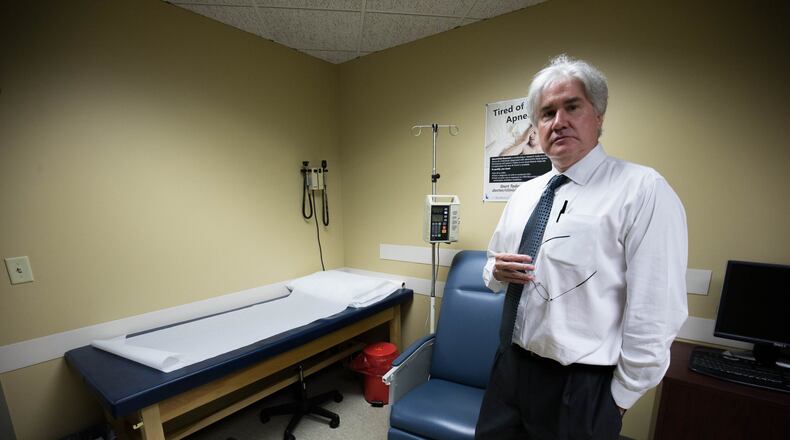 Dr. Michael Lacey poses for a portrait at NeuroTrials Research in Sandy Springs,. The doctors and clinical investigators at NeuroTrials Research are studying three medications showing promise for treating Alzheimer?s. BRANDEN CAMP/SPECIAL