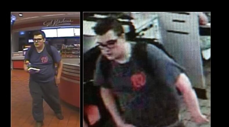 Gwinnett County police are looking for a suspect who they say stole a purse and a wallet from a Lawrenceville home.