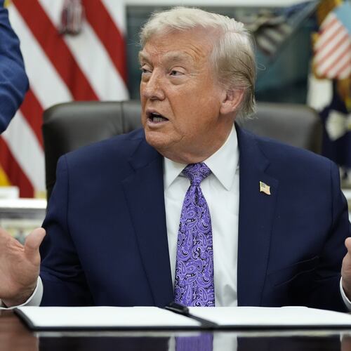 President Donald Trump gestures during a signing ceremony on an AI initiative in the Oval Office of the White House, Thursday, Dec. 11, 2025, in Washington. (AP Photo/Alex Brandon)