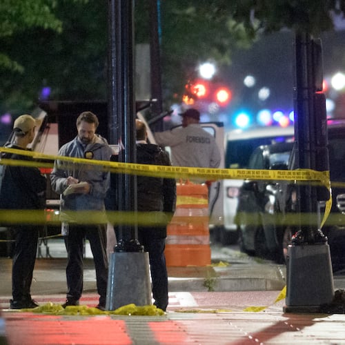 FILE - Law enforcement work the scene after two staff members of the Israeli Embassy in Washington were shot and killed outside the Capital Jewish Museum, May 22, 2025, in Washington. (AP Photo/Rod Lamkey, Jr., File)