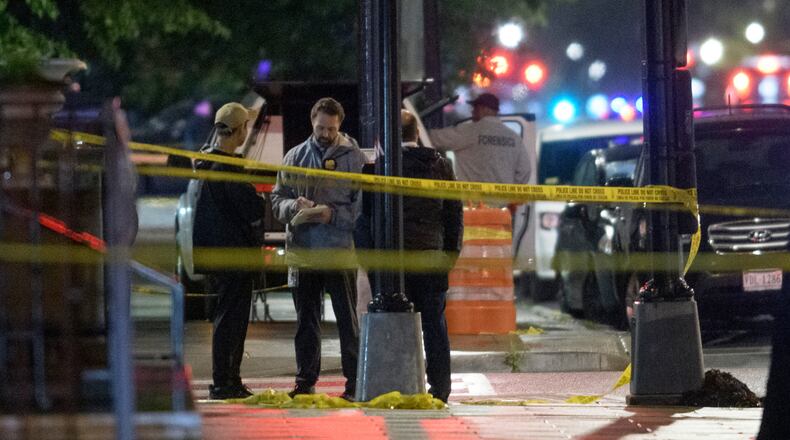FILE - Law enforcement work the scene after two staff members of the Israeli Embassy in Washington were shot and killed outside the Capital Jewish Museum, May 22, 2025, in Washington. (AP Photo/Rod Lamkey, Jr., File)
