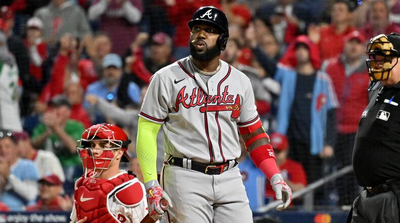 Atlanta Braves designated hitter Marcell Ozuna (20) strikes out against the Philadelphia Phillies during the ninth inning of game three of the National League Division Series at Citizens Bank Park in Philadelphia on Friday, October 14, 2022. (Hyosub Shin / Hyosub.Shin@ajc.com)