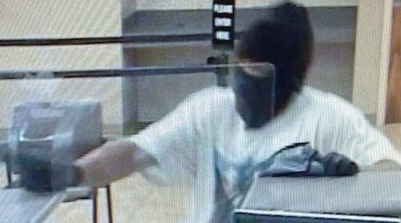 Authorities are searching for a robbery suspect who shot and critically injured a bank teller Monday in Warner Robins. (Photo courtesy of Warner Robins Police Department)