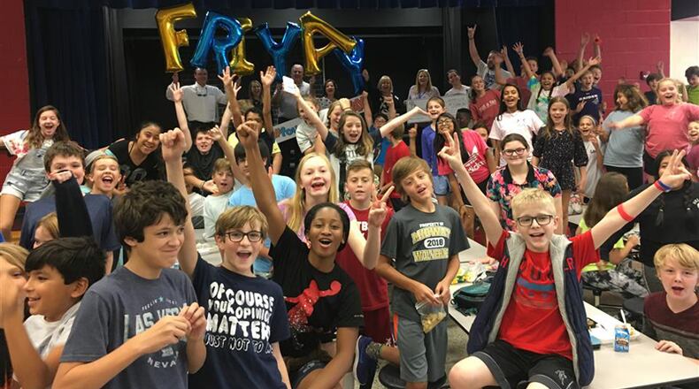 Liberty Middle School students celebrate receiving a Forsyth County Education Foundation grant for “Liberty’s Literacy Lab” in the 2018 grant awards. Recipients of 2019 grants totaling $60,000 were recently announced. FORSYTH COUNTY EDUCATION FOUNDATION