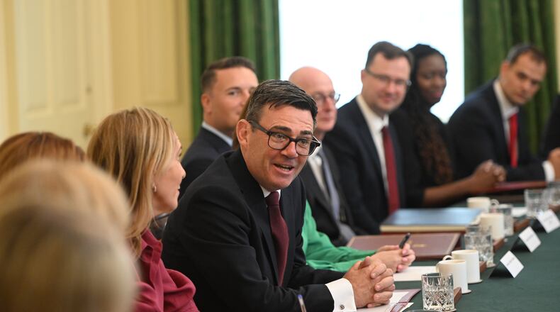 Britain's Prime Minister Andy Burnham, center, attends his first cabinet meeting as prime minister at 10 Downing Street, London, Tuesday July 21, 2026. (Eddie Mulholland/Pool Photo via AP)