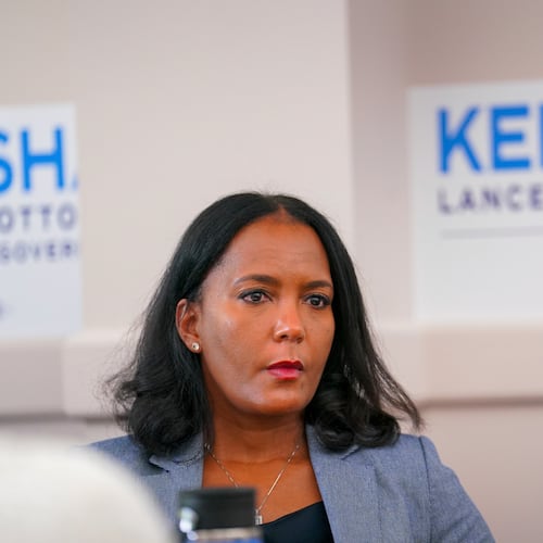 Georgia Democratic gubernatorial candidate and former Atlanta Mayor Keisha Lance Bottoms listens to laid off Centers for Disease Control and Prevention (CDC) workers during a roundtable in Clarkston, Ga., at the the start of her campaign tour, Thursday, July 24, 2025. (Matthew Pearson/WABE via AP)