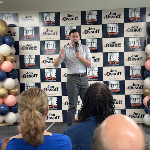 U.S. Sen. Jon Ossoff campaigns in south DeKalb County on Saturday, May 23, 2026. Ossoff said he believes he can win reelection by running against President Donald Trump's policies and showing unity with Georgia's Democratic candidate for governor, Keisha Lance Bottoms. (Greg Bluestein/AJC)