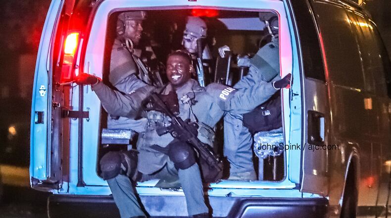 SWAT officers with the Fulton County Schools police and South Fulton police executed the arrest warrant at the home in the 2900 block of Falling Water Point.