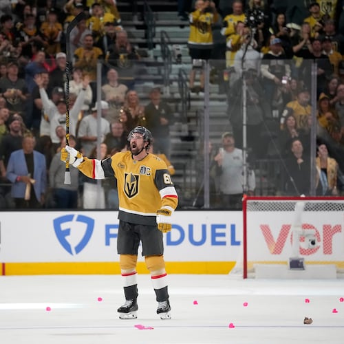 Vegas Golden Knights right wing Mark Stone celebrates after the Golden Knights won in the second overtime in Game 3 of the NHL hockey Stanley Cup Final series against the Carolina Hurricanes, Saturday, June 6, 2026, in Las Vegas. (AP Photo/John Locher)