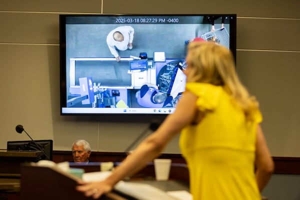 Defense attorney Ashleigh Merchant speaks as a Walmart security video is played during the bond hearing of Mahendra Patel, 57, in a Cobb County courtroom in Marietta on Tuesday, May 6, 2025. (Arvin Temkar/AJC)