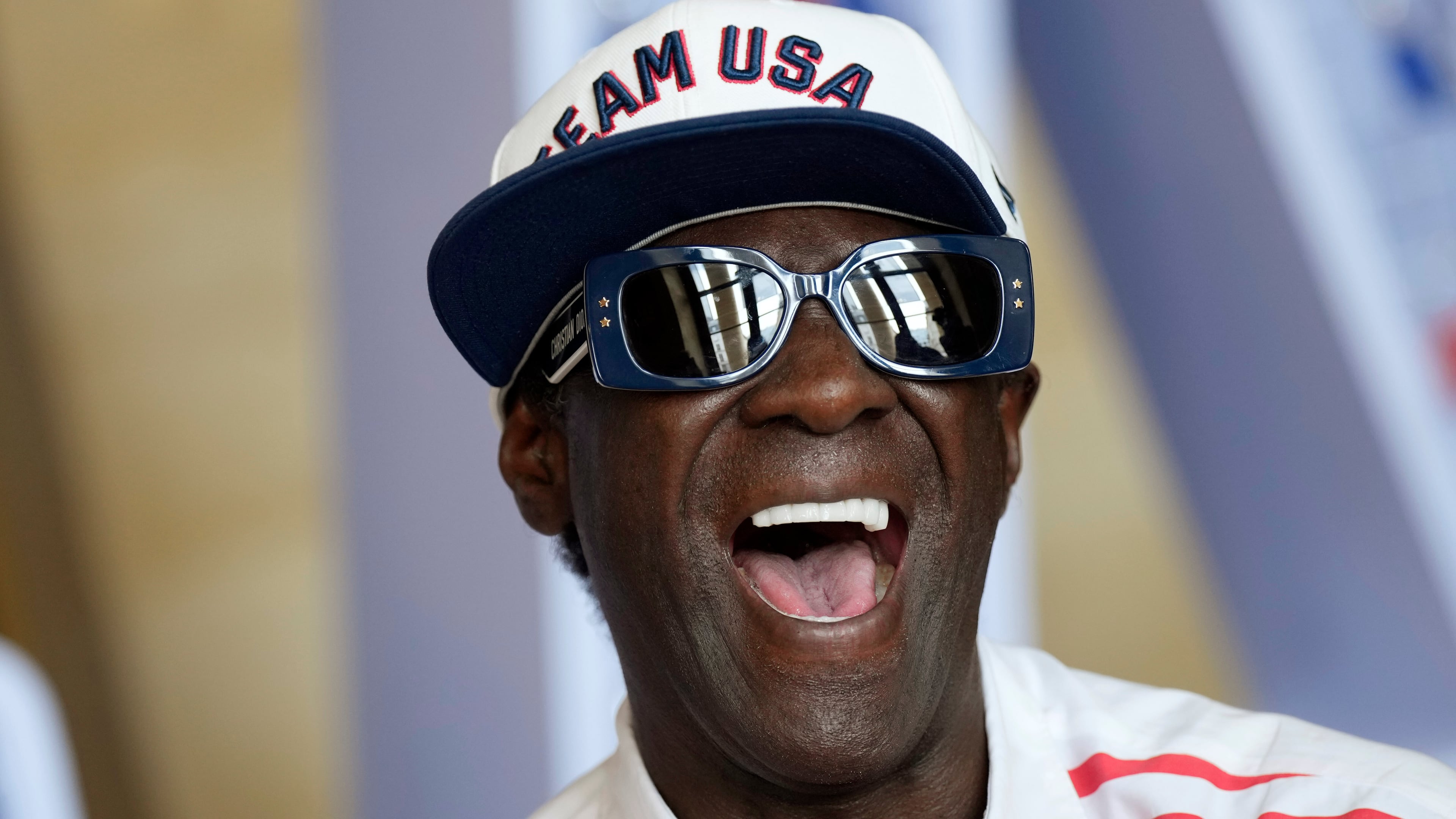 FILE - Flavor Flav laughs during an interview with The Associated Press at the USA house at the 2024 Summer Olympics, July 25, 2024, in Paris, France. (AP Photo/Luca Bruno, file)