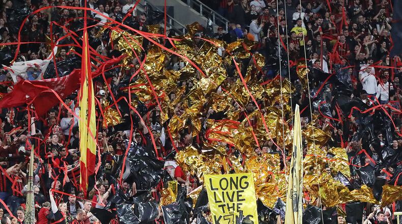 March 8, 2020 Atlanta: Atlanta United fans wave gold flags in honor of injured player Josef Martinez to start the home opener against FC Cincinnati in a MLS soccer match on Saturday, March 8, 2020, in Atlanta.   Curtis Compton ccompton@ajc.com