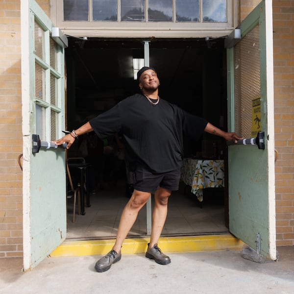 Southern Fried Queer Pride co-founder and executive director Taylor Alxndr, shown standing outside the Little 5 Community Center, says the organization works to provide a variety of options for people who want to participate in its events. (Estela Muñoz/AJC)