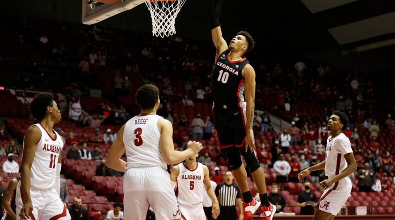 Georgia's Toumani Camara dunks against Alabama on Feb. 13, 2021 at Coleman Coliseum in Tuscaloosa, Ala. (Photo by Crimson Tide Photos)