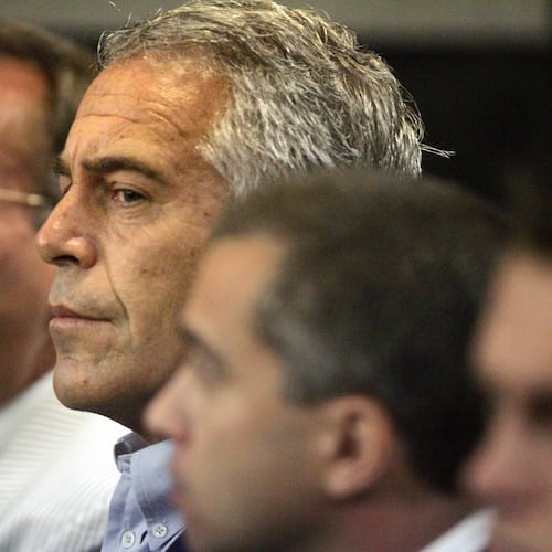 FILE - In this July 30, 2008, file photo, Jeffrey Epstein, center, appears in court in West Palm Beach, Fla. (Uma Sanghvi/The Palm Beach Post via AP, File)
