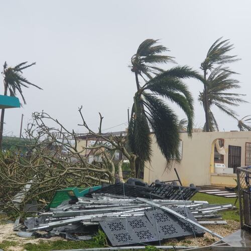 Debris covers the ground in Saipan on Wednesday, April 15, 2026, as a super typhoon with ferocious winds and relentless rains, shredded tin roofs and forced residents to take cover from flying tree limbs. (Office of the Mayor, municipality of Saipan via AP)
