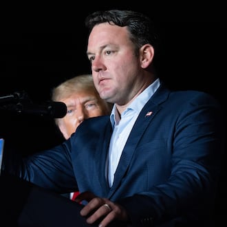 President Donald Trump (background) has endorsed Lt. Gov. Burt Jones in the governor's race in Georgia. (TNS)