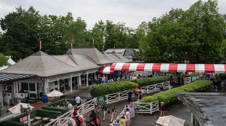 Jockeys walk thoroughbreds to the track for the second race of the day before the 158th running of the Belmont Stakes horse race at Saratoga Race Course, Saturday, June 6, 2026, in Saratoga Springs, N.Y. (AP Photo/Yuki Iwamura)