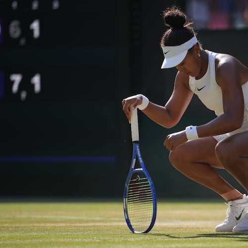 Naomi Osaka of Japan reacts to losing a point against Karolina Muchova of Czech Republic in their quarter-final women's singles match at the Wimbledon Tennis Championships in London, Tuesday, July 7, 2026. (AP Photo/Kin Cheung)