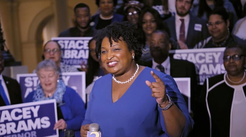 Gubernatorial candidate Stacy Abrams said she played no role in securing state contracts for a company that she co-founded and from which she drew a salary as a senior vice president. Abrams says she scrupulously avoided conflicts of interest while the company had the contracts. BOB ANDRES /BANDRES@AJC.COM