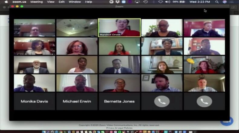 This screenshot shows the new normal for the DeKalb County Board of Education meetings, with school board members and other DeKalb County School District department leaders having their monthly meeting through the Zoom video conferencing application.