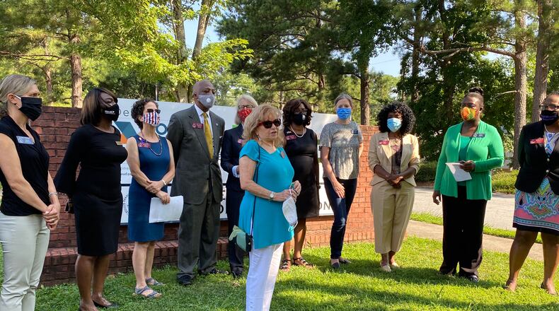 State Rep. Michele Henson, D-Stone Mountain, is flanked by other legislators from DeKalb County during a Monday morning press conference calling out Georgia labor commissioner Mark Butler over unpaid unemployment claims.
