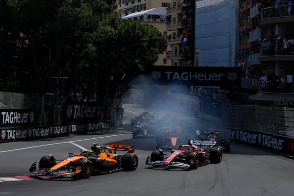 McLaren driver Lando Norris of Britain leads the field after the start during the Formula One Monaco Grand Prix race at the Monaco racetrack in Monaco, Sunday, May 25, 2025. (AP Photo/Manu Fernandez)