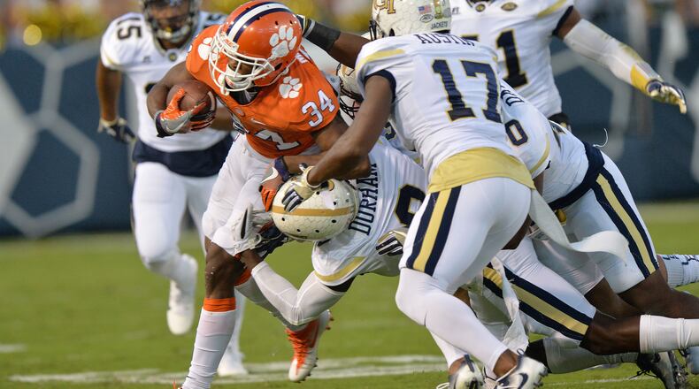September 22, 2016 Atlanta Clemson Tigers wide receiver Ray-Ray McCloud (34) gets tackled by Georgia Tech Yellow Jackets defensive back Step Durham (8) in the first half at Bobby Dodd Stadium on Thursday, September 22, 2016. HYOSUB SHIN / HSHIN@AJC.COM