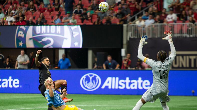Dom Dwyer, forward for Atlanta United, makes a shot on Philadelphia Union goalie Andre Blake during the Philadelphia Union vs. Atlanta United soccer game on Sept. 17, 2022, at Mercedes Benz Stadium in Atlanta. Atlanta United tied Philadelphia Union 0-0. CHRISTINA MATACOTTA FOR THE ATLANTA JOURNAL-CONSTITUTION.
