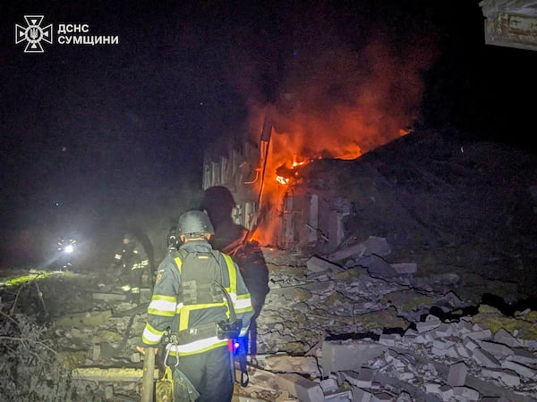 In this photo provided by the Ukrainian Emergency Service, firefighters put out the fire of a city hospital following a Russian attack in Sumy region, Ukraine, Tuesday, July 15, 2025. (Ukrainian Emergency Service via AP)