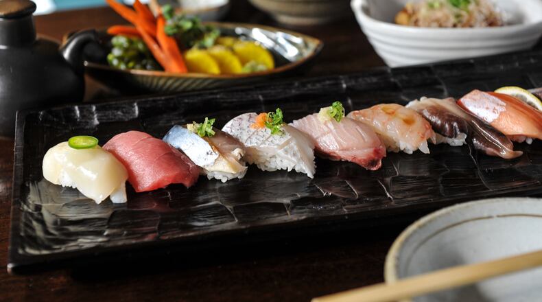 Assorted sushi , takoyaki and pickles at Craft Izakaya. / (Beckysteinphotography.com)