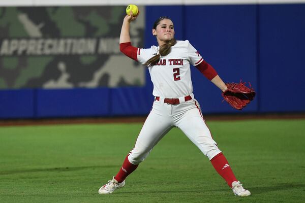 Texas Tech outfielder Demi Elder throws during the second game of the NCAA softball Women's College World Series finals against Texas in Oklahoma City, Thursday, June 5, 2025. (AP Photo/Kyle Phillips)
