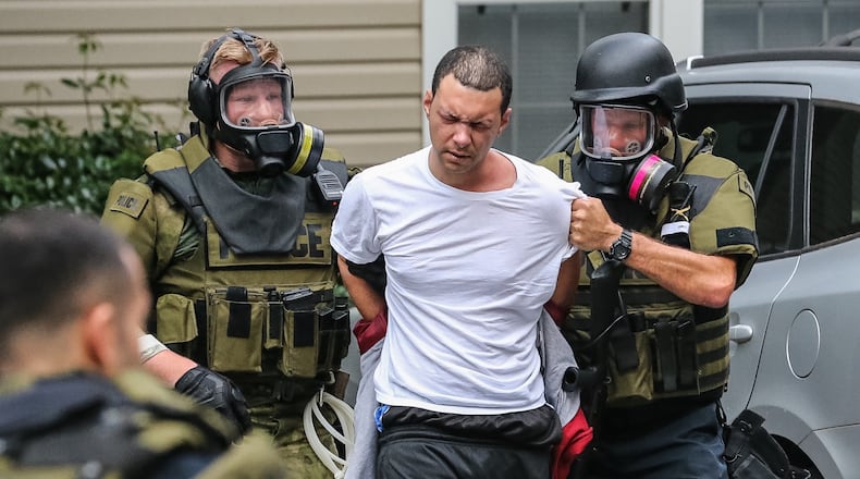 A man barricaded himself inside a unit at the Brighton Way Apartment Homes in Smyrna, police spokesman Louis Defense said. JOHN SPINK / JSPINK@AJC.COM