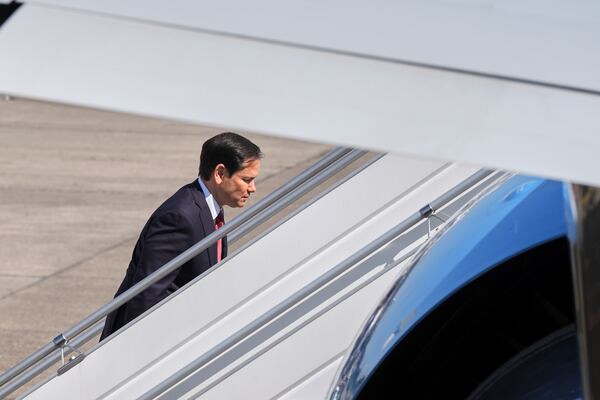 U.S. Secretary of State Marco Rubio boards to the plane after his trip in Brussels, Friday, April 4, 2025. (AP Photo/Jacquelyn Martin, Pool)