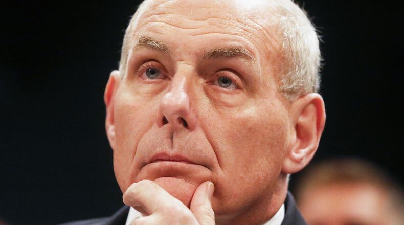 WASHINGTON, DC - FEBRUARY 07: Homeland Security Secretary John Kelly (R) prepares to testify to the House Committee On Border Security on Capitol Hill on February 7, 2017 in Washington, D.C. Kelly spoke about border security and President Trump's recent travel ban. (Photo by Mario Tama/Getty Images)