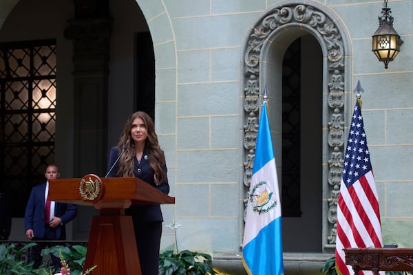 U.S. Homeland Security Secretary Kristi Noem listens as Guatemalan Interior Minister Francisco Jimenez speaks during a signing ceremony, at the National Palace in Guatemala City, Thursday, June 26, 2025. (AP Photo/Moises Castillo)