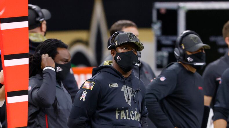 Falcons head coach Raheem Morris watches the action on the field Sunday, Nov. 22, 2020, against the Saints in New Orleans. Atlanta lost 24-9. (Tyler Kaufman/AP)