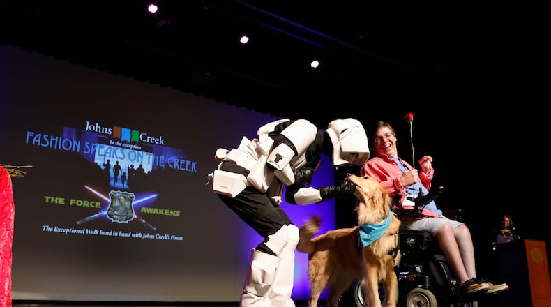 A model enjoys being part of the fashion show. This year’s “Johns Creek Fashion Speaks on the Creek: A Fashion Show for the Exceptionals” will be held Sunday, Sept. 29. (Photo: STARR PETRONELLA)