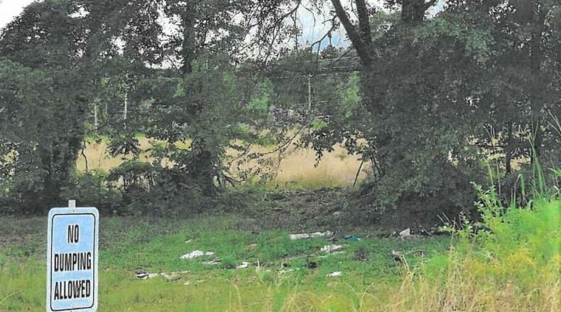 Kennesaw voted Tuesday to abandon use of Chalker Park, this public park off Rocksprings Drive. City officials said it has fallen into disrepair as is being used as a dumping ground. (Photos courtesy of City of Kennesaw)