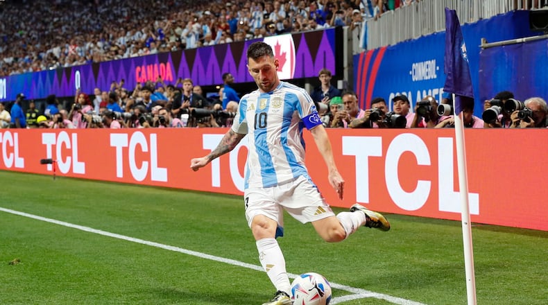 Argentina forward Lionel Messi (10) takes a corner kick during  in the second half of the Copa America match against Canada at Mercedes-Benz Stadium on Thursday, June 20, 2024.
(Miguel Martinez / AJC)