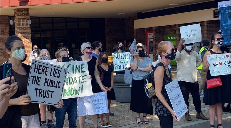 University of Georgia faculty members hold a rally on the Athens campus on Sept. 14, 2021, for additional measures to prevent the spread of COVID-19, such as mask mandates. (Eric Stirgus / eric.stirgus@ajc.com)