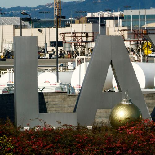 FILE - Air traffic is seen on the runway at Los Angeles International Airport on Sunday, Dec. 25, 2022. (AP Photo/Damian Dovarganes, File)