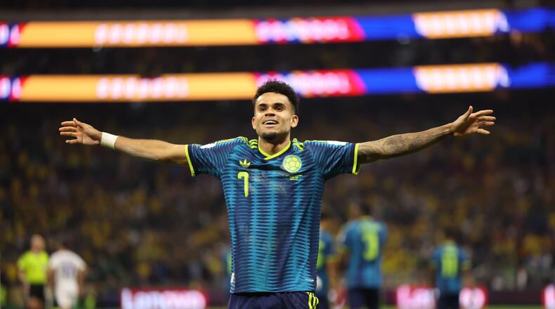 Colombia's Luis Diaz (7) celebrates after scoring their second goal during the World Cup Group K soccer match between Uzbekistan and Colombia in Mexico City, Wednesday, June 17, 2026. (AP Photo/Ashtin Barker)