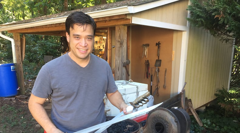 Lilburn's Eric Anthony Leong creates props for movies and TV shows. These swords were used on the NBC TV show "Revolution." CREDIT: Rodney Ho/ rho@ajc.com