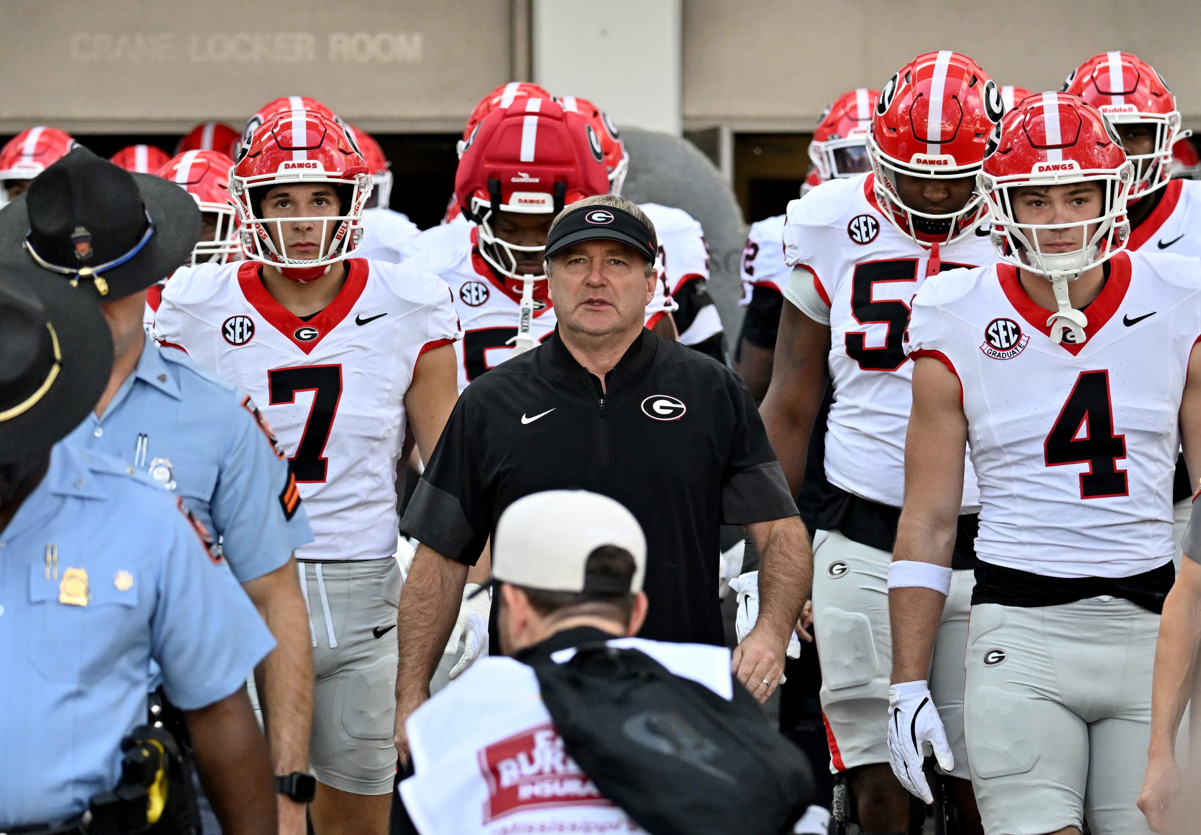 Georgia head coach Kirby Smart and players take on the field for pregame warm-up drills prior to an NCAA football game against Mississippi State at Davis Wade Stadium, Saturday, November 8, 2025, in Starkville, Mississippi. (Hyosub Shin / AJC)