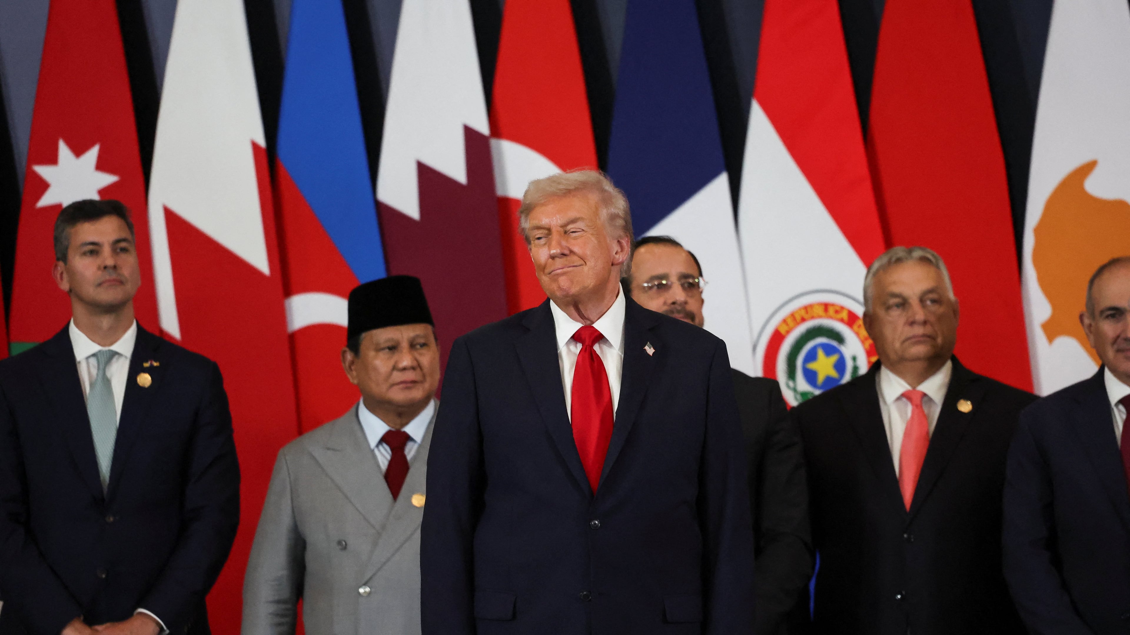 U.S. President Donald Trump, center, attends the Gaza International Peace Summit in Sharm el-Sheikh, Egypt with, from left, Paraguay's President Santiago Pena, Indonesian President Prabowo Subianto, Cyprus' President Nikos Christodoulides and Hungary's Prime Minister Viktor Orban, Monday, Oct. 13, 2025. (Suzanne Plunkett/AP)