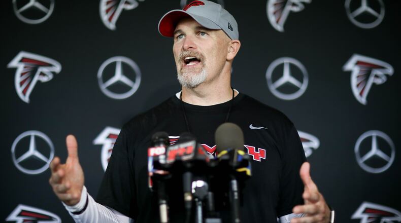 Atlanta Falcons head coach Dan Quinn talks to reports during training camp, Saturday, July 28, 2018, in Flowery Branch, Ga. BRANDEN CAMP/SPECIAL
