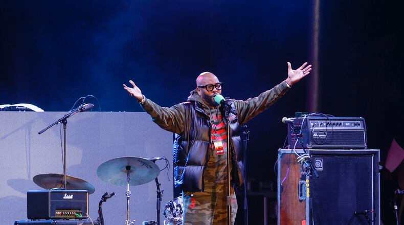 Ryan Cameron hosts the New Year's Eve Peach Drop celebration at Underground Atlanta on Dec. 31, 2022, in Atlanta. (Natrice Miller/The Atlanta Journal-Constitution/TNS)