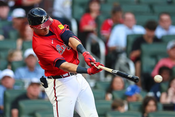 Atlanta Braves' Austin Riley hits a double in the third inning of a baseball game against the Baltimore Orioles, Friday, July 4, 2025, in Atlanta. (AP Photo/Colin Hubbard)