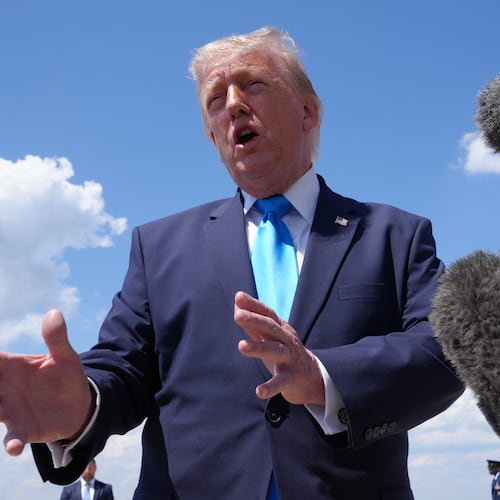 President Donald Trump speaks to the press after returning and stepping off Air Force One, Wednesday, May 20, 2026, at Joint Base Andrews, Md., after speaking at the U.S. Coast Guard Academy commencement. (AP Photo/Jacquelyn Martin)